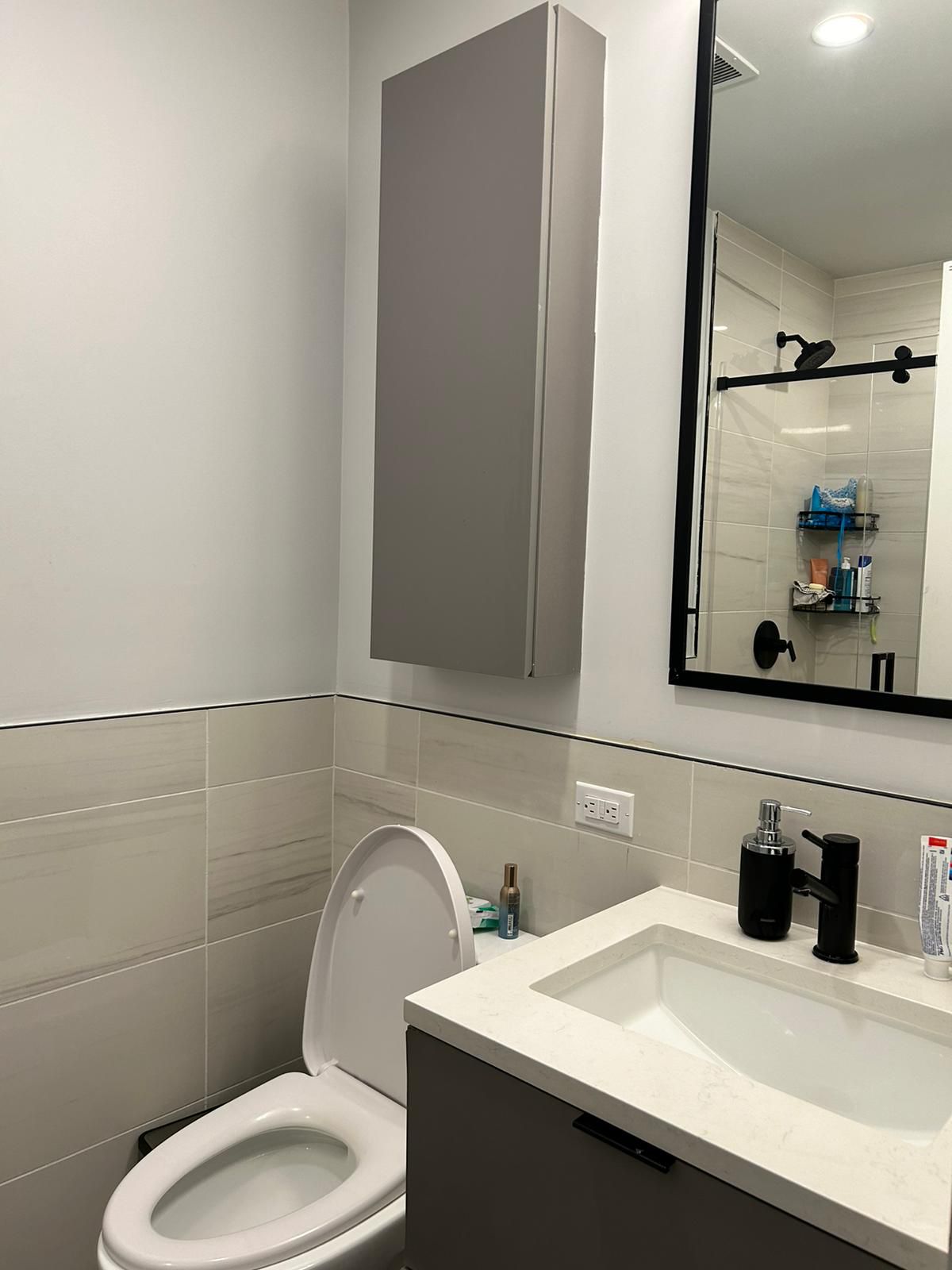 Clean modern bathroom with white fixtures